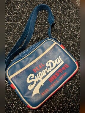 Superdry Blue Crossbody Bag with White and Red Accents